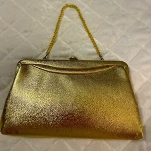 Vintage Gold color evening purse with gold chain. Will hold iPhone etc.